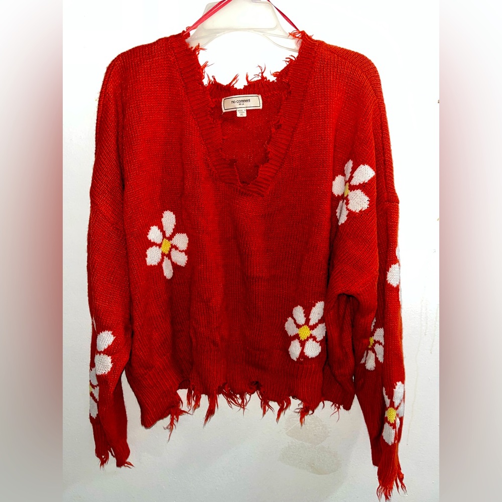 Orange sunflower cropped knit sweater.